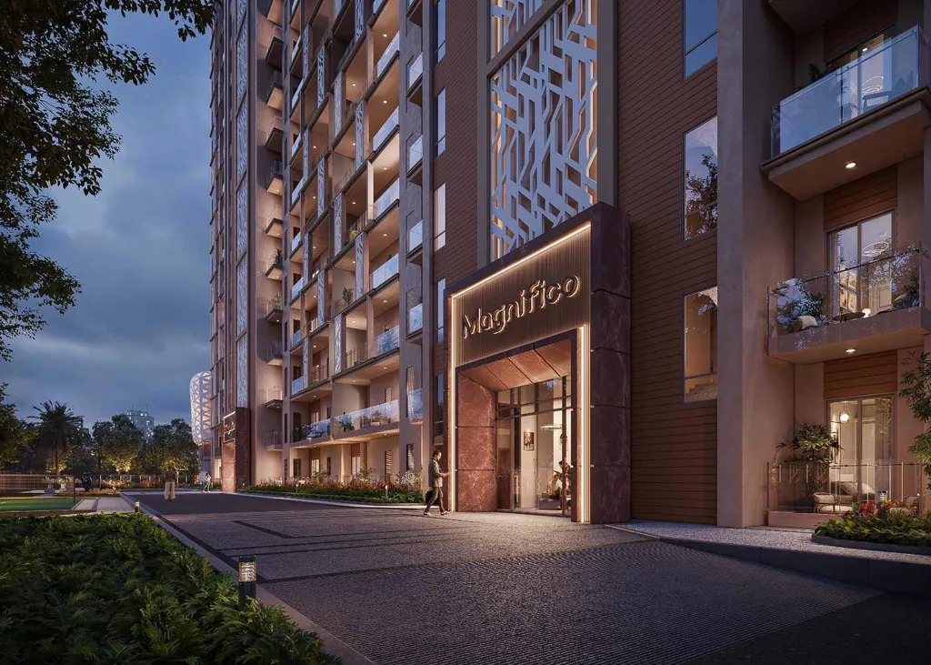 The Magnifico tower entrance at dusk, lattice screens lit above the portal — artistic render from the developer's brochure